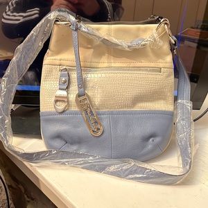 B. Makowsky white and blue leather bag